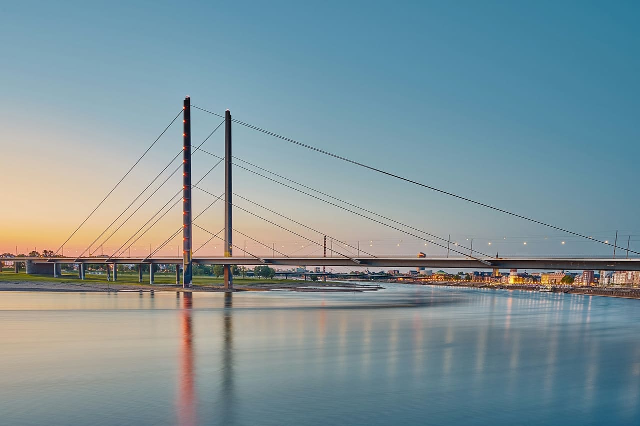 Rheinkniebrücke and Rhine promenade in Düsseldorf, the firm's location